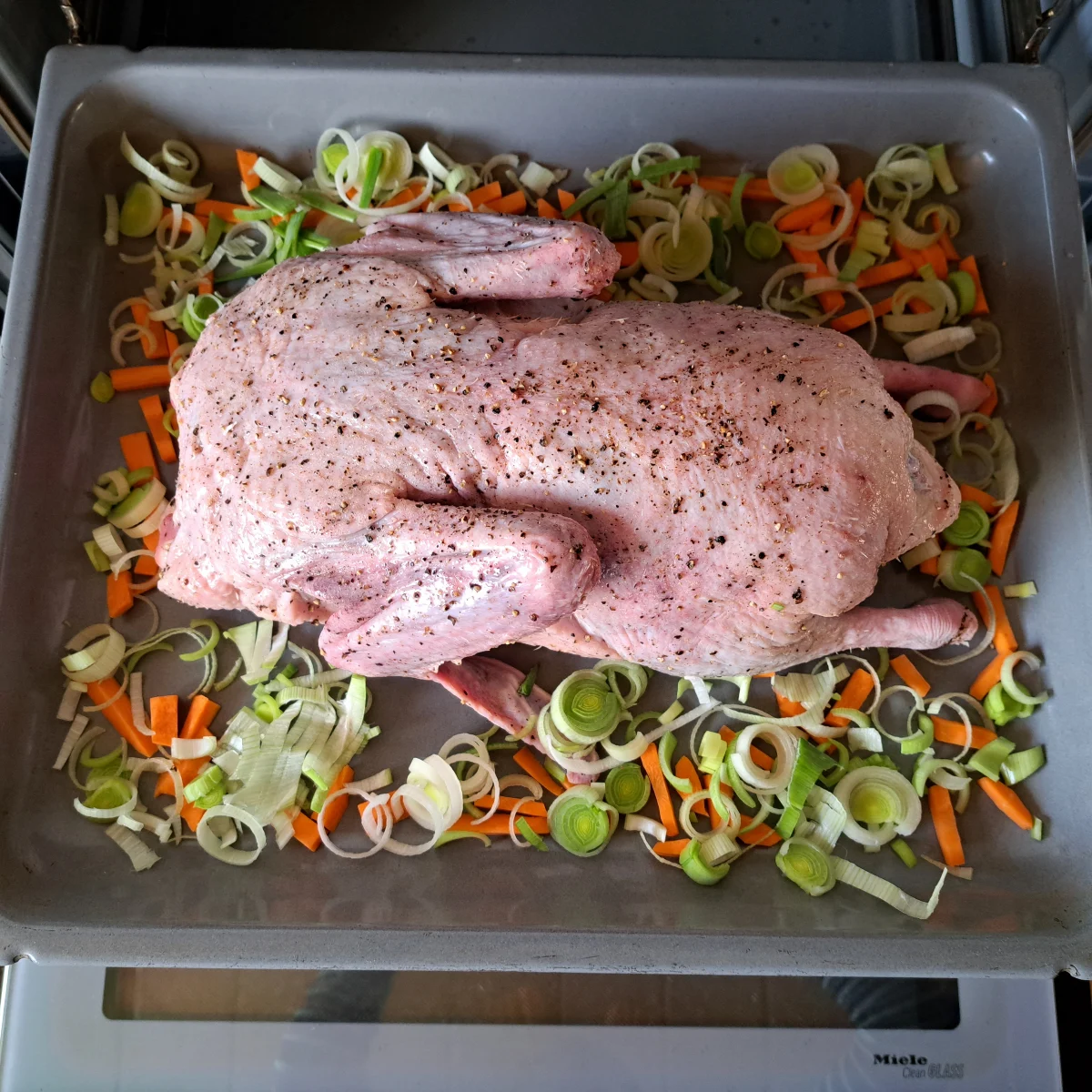 German roasted duck ready to be placed into the oven for roasting.