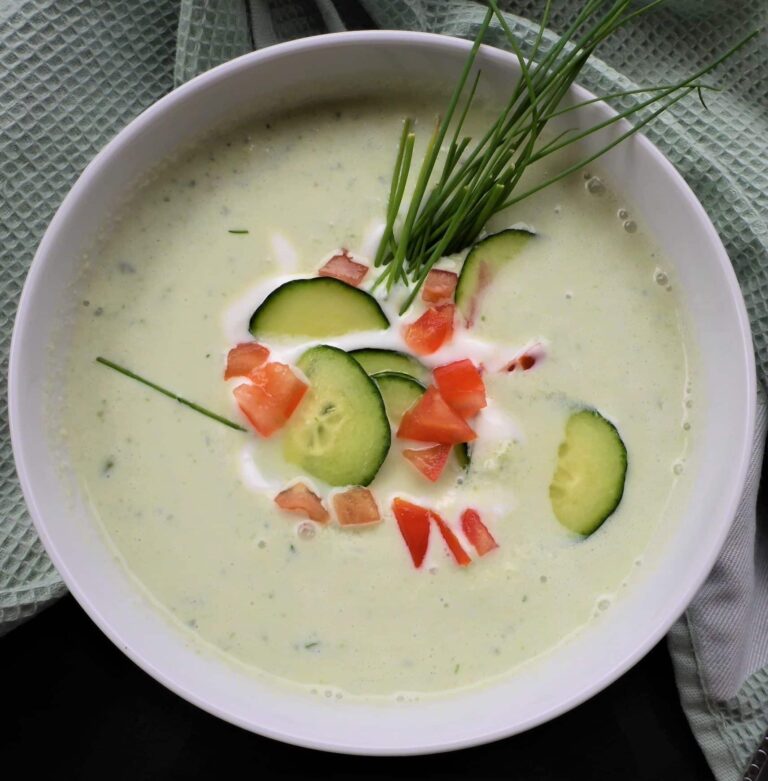 Cold cucumber soup with sour cream, yogurt and chives