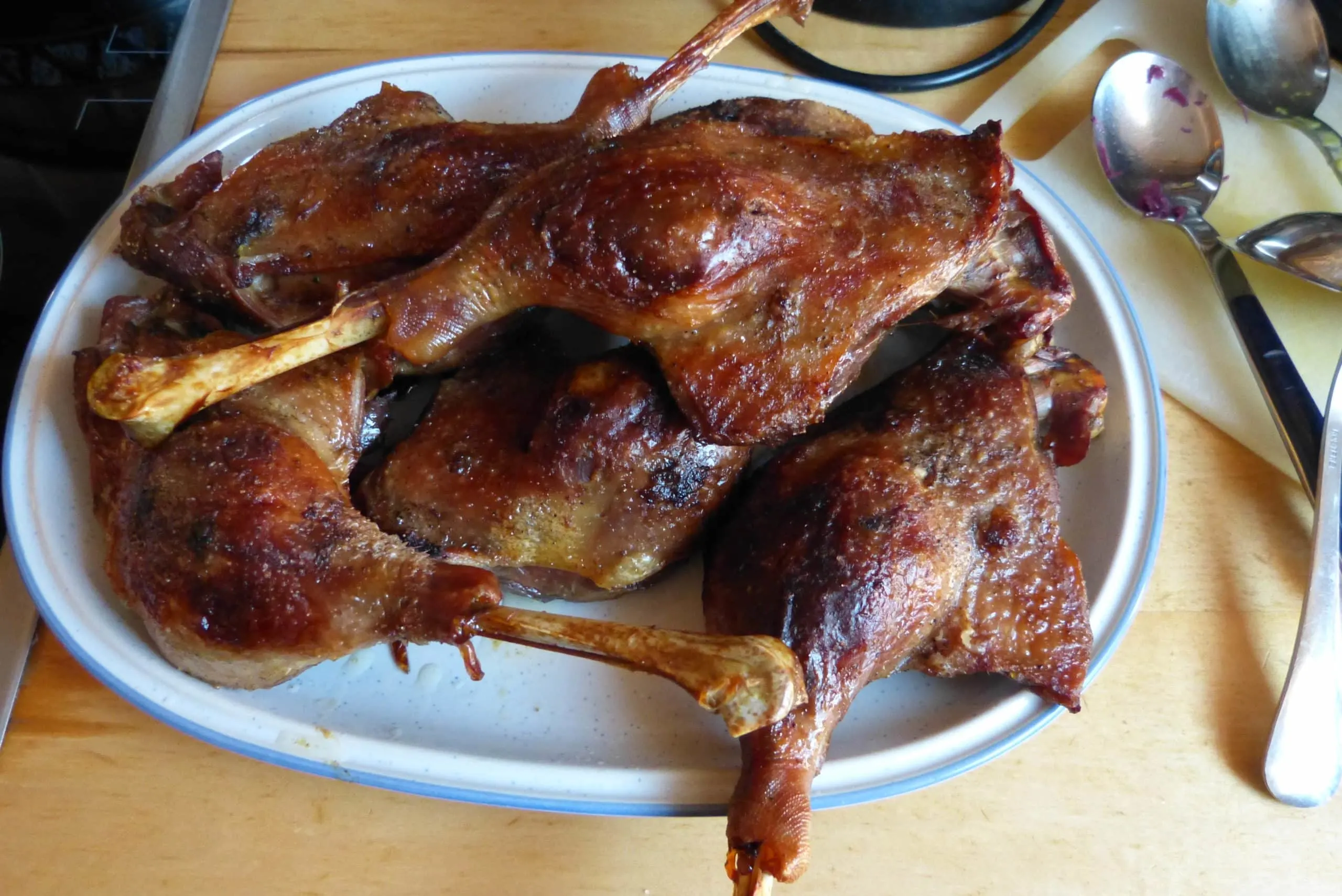 Fresh from the oven: Perfectly golden brown German roasted goose legs on a platter.