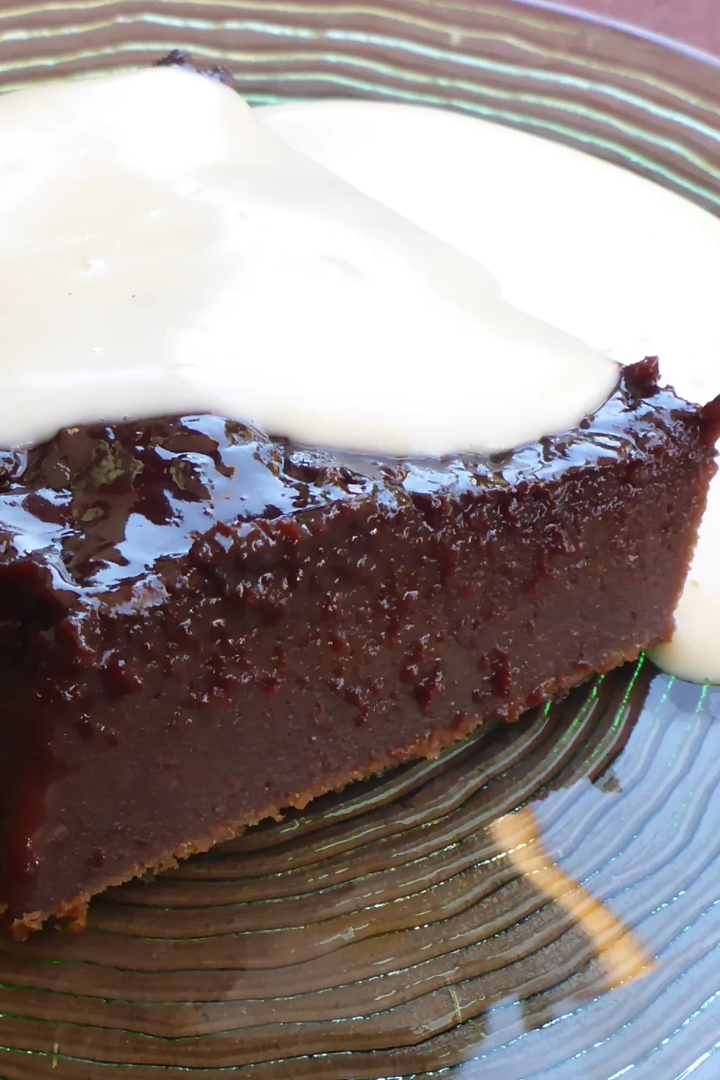 malva pudding with chocolate served with custard.