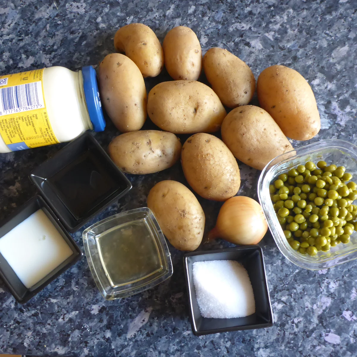 A photo showcasing the ingredients used to make Namibian potato salad. 