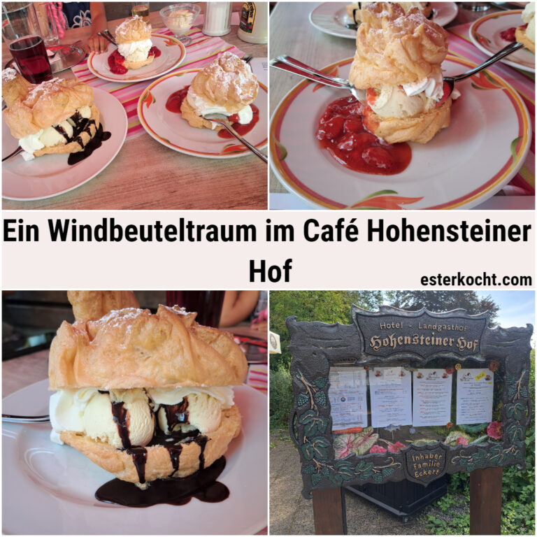 Verschiedene Windbeutel und ein Schild am Eingang des Hohensteiner Hof. Das Schild zeigt die Speisekarte, den Namen des Cafés und den Namen des Besitzers.